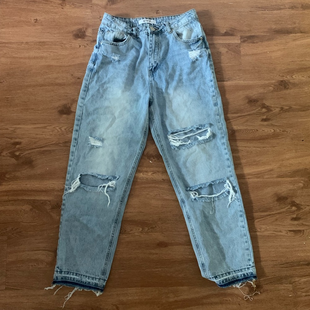 Distressed light wash grey bandit jeans